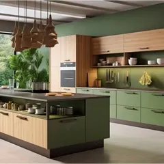 This nature-inspired kitchen combines sage green and light wood cabinets for a calming, organic feel. The large island offers extensive storage with open shelves and deep drawers, plus a generous food prep area.