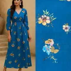 From a roll of fabric to a beautiful dress. This flowy blue floral dress is an example of what you can create with our soft, printed textiles for a perfect brunch or day-out look.