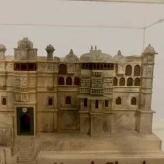 The intricate architectural details of the handcrafted 3D model. I believe in sourcing and creating favors that are as unique as the wedding itself.