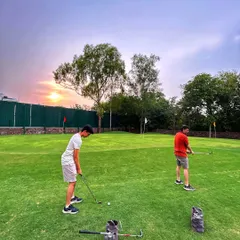 Drive for show, putt for dough. The work continues on the putting green, where you can dial in your short game as the sun sets.
