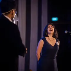 Another angle of that wonderful, joyous laughter from an audience member on stage. Her happiness is infectious and shows the power of interactive entertainment.