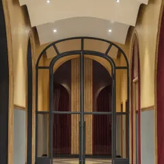 The entrance corridor at Nishtara features a series of grand arches, guiding guests into the main hall. The design draws from Gothic and Romanesque influences, creating a sense of anticipation and drama from the moment of arrival.
