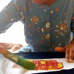 The magical moment of reveal. A child paints over the "invisible" message with a special solution, watching as the secret writing appears. This experiment is always a huge hit.