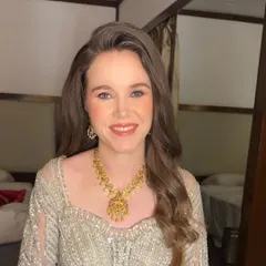 A smiling portrait of Sarah, our bride from the USA. I created a soft and natural look that enhanced her beautiful blue eyes and fair complexion.