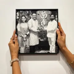 One of the individual pieces from the Kiran Gems project, featuring a meeting with Chief Minister Eknath Shinde. Each photo is framed in a sleek, modern black metal frame, ensuring a consistent and professional aesthetic across the entire wall.