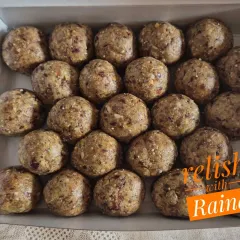 A box of my sugar-free Dry Fruit Laddoos, where the dry fruits are coarsely ground. This texture is often preferred by clients for their children, making it easier for them to eat while getting all the nutrition.