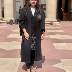 Standing on the grounds of the Supreme Court, committed to fighting for the justice my clients deserve.