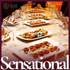 "Sensational." A beautifully set dining table with plates of appetizers ready for guests. This image represents the seamless service and culinary excellence that define a sensational catering experience.