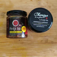 A close-up of our ready-to-eat Chorizo in a Jar. Made from authentic Goa pork sausages, it's a taste of vacation in every bite.