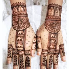 A simple yet elegant design featuring a procession of baby elephants down the center of the hand. This is a lovely choice for guests or for a more minimalist sangeet look.