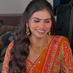 A happy bride showing off her fresh and radiant engagement makeup. The focus is on a flawless base and soft matte eyes, creating a look that is both beautiful and timeless.