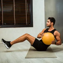 The Russian twist with a medicine ball is a fantastic exercise for building rotational core strength and sculpting your obliques.