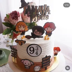 How magical is this Harry Potter cake? Our handmade paper topper set, including cute chibi characters and the Platform 9 3/4 sign, makes it easy to create a themed cake without fancy fondant.