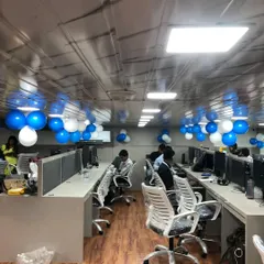The main workspace decorated for the office opening. We placed balloon bunches along the ceiling to add a celebratory feel without disrupting the work environment.