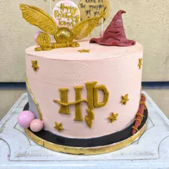 I solemnly swear I had the best time making this Harry Potter cake. It's packed with magical details like a golden snitch, the sorting hat, and the iconic HP logo, all handcrafted from fondant for the ultimate Potterhead's birthday.