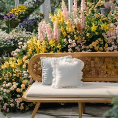 Where soft ruffles meet a garden in bloom. These simple white and blue ruffled cushions were the perfect complement to the lush, floral-filled setting of the greenhouse Haldi.