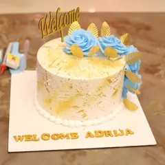 A close-up of the beautiful "Welcome Adrija" cake. I always make sure to capture the details that you've put so much thought into for your event.