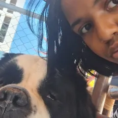 A close-up selfie with our sleepy-eyed St. Bernard, capturing a moment of quiet connection.