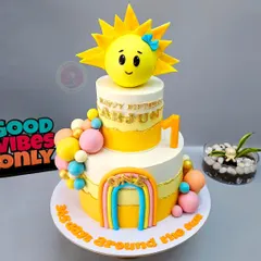 A beautiful sun-themed cake, an example of the stunning creations you can make after joining our "Ganache Game Made Easy" masterclass.