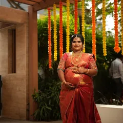 My favourite client Shruthi at her Valaikaappu (baby shower). I draped her beautiful red silk saree to be comfortable and elegant, ensuring she felt special on her big day.