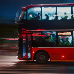 Using a panning motion, I captured the speed of a red double-decker bus at night. The blurred background and light trails convey the energy and constant movement of Mumbai's streets.