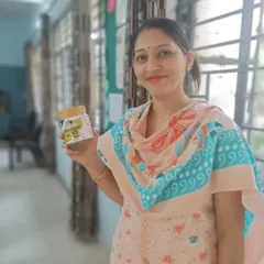 This customer proudly holds up a jar of our Amla Candy. It is wonderful to see our products being enjoyed by people from all walks of life.