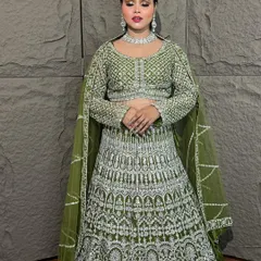 This olive green lehenga with heavy silver embroidery is a showstopper. It’s a fantastic rental option for a bride or bridesmaid for a sangeet or reception.