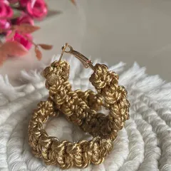 Another look at the golden hoops. They are a great accessory for when you want something that is handmade, unique, and has a bit of sparkle.