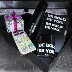 We offer variations to fit different needs and budgets. This version of the Alt F gift set includes a branded sipper, notebook, mug, a gourmet chocolate bar, and one of our Miara soy wax candles.