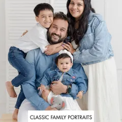 A classic family portrait is more than just a photo; it's a feeling. The pure, unscripted joy of the Baliya family, all dressed in classic denim and white, is a perfect example of the timeless memories we capture in the studio.