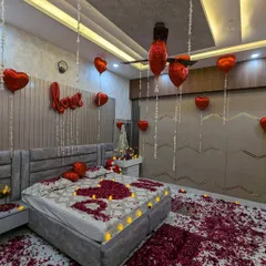 For a classic romantic surprise, I use a combination of heart-shaped foil balloons, rose petals, and safe LED candles. This setup is perfect for anniversaries, birthdays, or just to show someone how much you care.