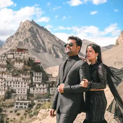 A candid moment of joy with the majestic mountains of Spiti Valley as the witness. This shot perfectly blends high fashion with the raw beauty of the Himalayas.