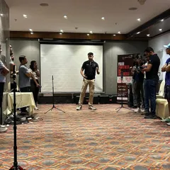 Leading a discussion with a group of coaches. My workshops are not just lectures. They are interactive sessions designed to tackle the hard questions about applying sports science in a team environment.