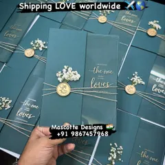 A stunning teal acrylic invitation that reads "I have found the one my soul loves." This modern and minimalist design is finished with twine, a custom wax seal, and baby's breath, showcasing a simple yet powerful statement.