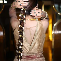 Another view of the creative bridal braid, showing how it complements the back of the blouse.