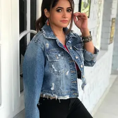Styling the iconic Miss Pooja for 'Makkhi'. I gave her a cool, contemporary look with a distressed denim jacket over a bright top and black jeans, accessorized with oxidized silver jewelry for an edgy touch.