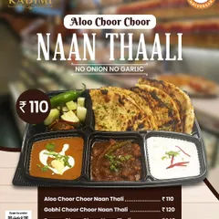 The Aloo Choor Choor Naan Thali is a crowd favorite. It comes with our special Pindi Chole, Dal Makhni, Raita, and salad, offering a satisfying meal that's easy to serve at any function.