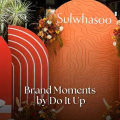 For the launch of the luxury beauty brand Sulwhasoo, we designed a custom backdrop that was a true reflection of their story. The warm, earthy tones and topographic line art speak to the brand's heritage and connection to nature, creating an artful and sophisticated brand activation.