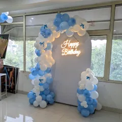 The asymmetrical design of this balloon arch adds a modern and stylish touch to the party decor.