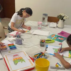Art class is always better with best friends. These girls are working on their succulent-themed artwork in one of our cozy at-home group sessions.