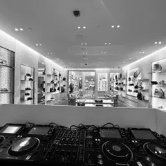 The view from the DJ booth at the Dior store launch in Bombay. The setup was clean and minimalist, letting the music and the collection take center stage.