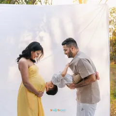 The sweetest moment! The soon-to-be big brother giving his future sibling a little kiss on the bump. These are the playful, heartwarming interactions I love to capture during a family maternity session.