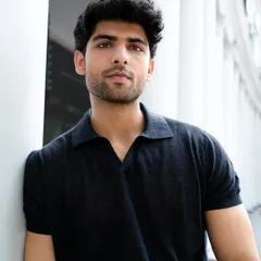 A direct and engaging portrait of a model looking at the camera. This kind of shot is crucial for a portfolio, showing confidence and connecting with the viewer.
