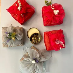 These are just some of the gorgeous, fabric-wrapped gifts created by participants in one of my recent workshops. Everyone gets to take home what they make, and I love seeing the unique touch each person brings to their work.