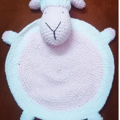 A soft and cozy sheep-themed baby playmat, made with plush velvet yarn. It's a perfect, safe space for tummy time and play, and makes a wonderful baby shower gift.