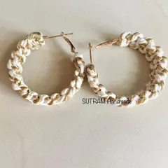 A pair of my white and gold macrame earrings. These are a beautiful gift idea for bridesmaids or for anyone who loves handmade jewelry.