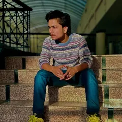 Sitting on the steps, thinking about the climb. Every step is part of the process, a theme I often explore in my motivational rap about the hustle and the journey to success.