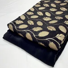 The classic combination of black and gold is shown in this crepe jacquard set. The woven pattern adds a luxurious texture, making it suitable for evening wear or formal kurtas.