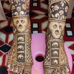 This foot design features panels of elephants, a popular and auspicious motif for bridal henna.