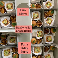 An overhead view of my fun and ready-to-eat snack boxes, all set for a birthday party. These customizable boxes are a hassle-free way to delight your little guests.